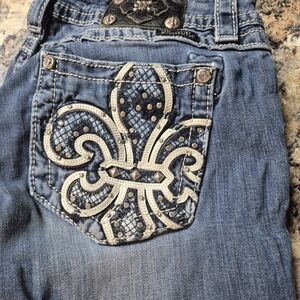 Rock Revival Light Blue Denim Bootcut Jeans with Fleur-de-Lis Pocket